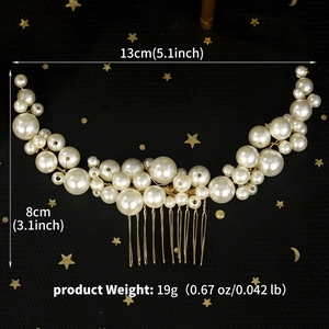 Detail view of pearl wedding hair comb with gold metal teeth and 13cm size markings
