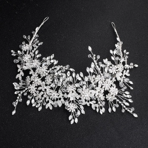 Detail of bridal headband with silver wire, crystal beads, and rhinestones on black