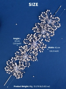 Detailed macro view of luxury silver bridal headband with crystal flowers and tassels