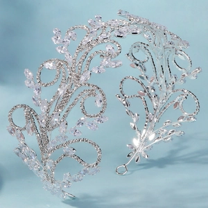 Serre-tête de mariée élégant en métal argenté avec motif de feuilles et strass