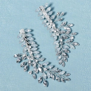 Elegant silver leaf crystal hair clips for weddings featuring handmade rhinestones and gems