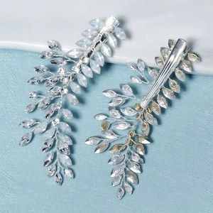Exquisite silver bridal hair clips featuring marquise crystals in a vine-inspired design