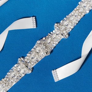 Elegant bridal wedding dress belt with luxury crystal flowers on white silk ribbon