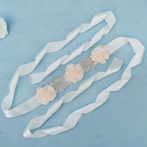 Elegant bridal sash with ivory chiffon flowers and sparkling silver rhinestone accents