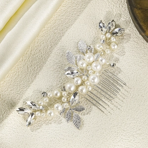 Elegant silver bridal hair comb with pearls and marquise crystals in leaf design