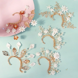 Handmade clay floral elf ear cuffs with pearls and crystals in fairy forest style