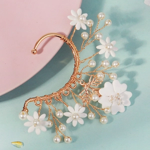 Handmade floral ear cuff with white clay beads and pearls on golden wire for weddings