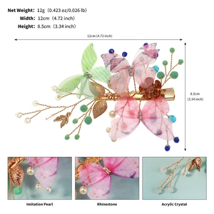 Detailed view of 12cm butterfly hair clip with crystals, pearls, and size measurements