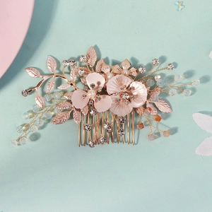 Vintage rose gold floral hair comb with crystals and pearls for bridal hairstyles
