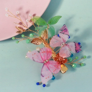 Pince à cheveux fée papillon avec ailes en tulle colorées et perles de cristal dorées