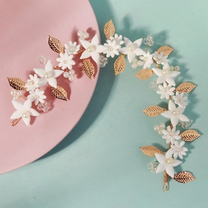 Handmade gold leaf flower headband with white petals and pearls for bridal wedding attire