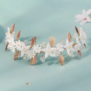Golden leaf and white flower bridal headband with pearls and crystals for weddings