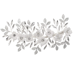 Elegant white floral bridal hair clip with pearls and crystals for wedding hairstyles