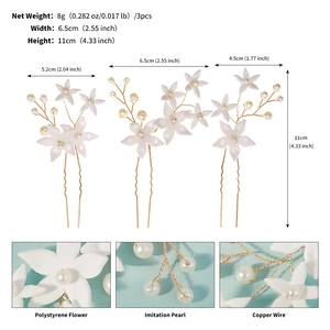 Detail showing the dimensions and materials of white floral bridal hair pins in a 3-piece set