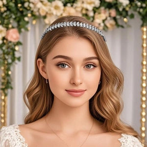 Elegant silver bridal headband featuring marquise-cut zircon crystals on a model