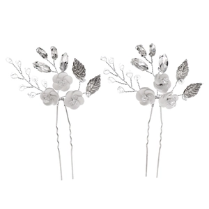 Elegant handmade ceramic flower hair pin with silver leaves and rhinestones for bridal hairstyle