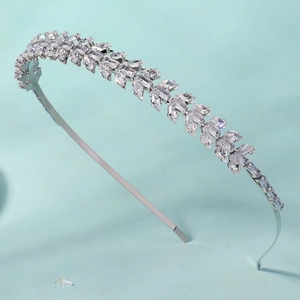 Macro shot of silver plated headband featuring rows of marquise and rectangular cubic zirconia