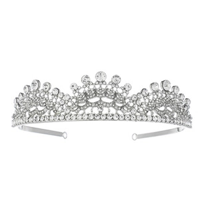 Close-up of luxury silver bridal crown with intricate sparkling white zircons and crystals