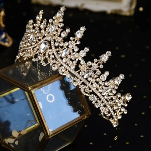 Luxurious vintage bridal tiara with baroque gold alloy and sparkling rhinestones