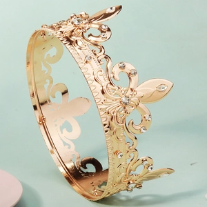 Detailed view of the vintage gold baroque crown featuring intricate hollow floral patterns
