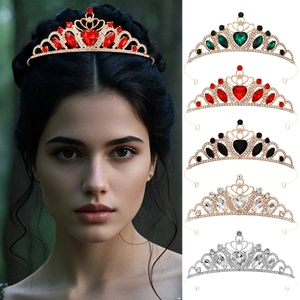 Detailed close-up of heart-shaped crystal crowns in red, green, black, and silver