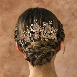 Bridal hair comb set with vintage pink satin flowers, pearls, and crystals in a golden finish