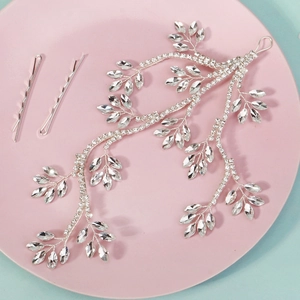 Elegant rhinestone leaf hair vine with silver pins for bridal wedding styling