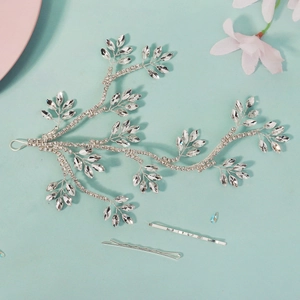 Silver bridal hair vine set with sparkling crystals and leaves for wedding hairstyles