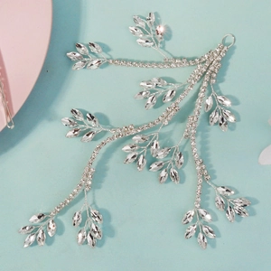 Detailed view of silver bridal hair vine with marquise crystal leaves for wedding styles
