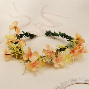 Peach and yellow floral headband crown with adjustable pink silk ribbons for brides
