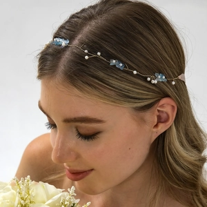 Handmade bridal hair vine with blue flowers and white pearls on golden wire