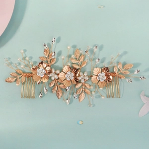 Vintage floral bridal hair comb with gold petals, white pearls and sparkling crystals