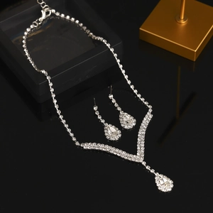 Elegant bridal jewelry set with silver rhinestone Y-necklace and matching teardrop earrings