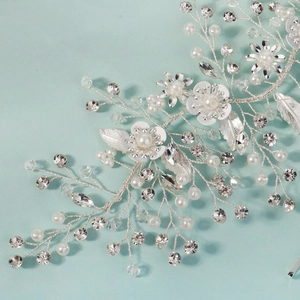 Silver bridal hair vine with white pearls, crystals, and enamel flowers for wedding attire