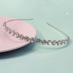 Serre-tête élégant en strass argenté avec motif tournesol en cristal pour femmes