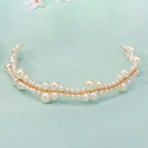 Handmade bridal headband with white pearls woven on gold wire for weddings and parties