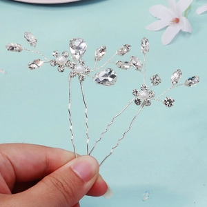 Floral bridal hair pin set with rhinestones and pearls on silver metal base