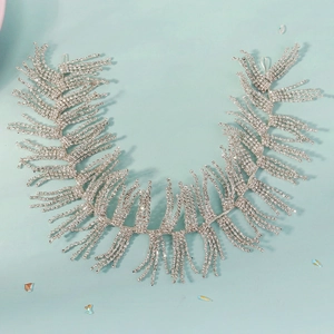 Close-up of luxury bridal headband with silver tassels and sparkling rhinestone inlay