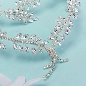Elegant silver bridal headband with crystal leaf vine design for weddings and parties