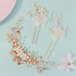 Elegant bridal hair accessory set with rose gold floral vine, pearls and crystal hairpins