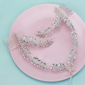 Bridal rhinestone hair vine set with silver leaves and crystal combs for wedding styling
