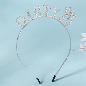 Detailed view of silver birthday headband with crystal Dirty 30 and crown decoration