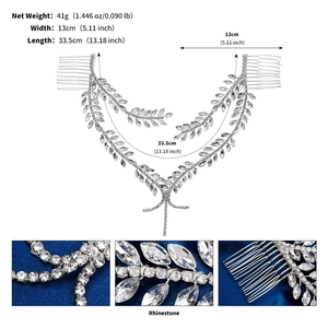 Close-up of bridal rhinestone hair comb with leaf design, measuring 33.5cm x 13cm
