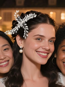 Close-up of bridal crystal leaf hair clip with marquise rhinestones and silver finish