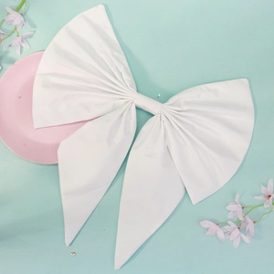 Elegant oversized white fabric bow brooch with flowing ribbons for wedding dress decoration