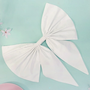 Large white fabric bow with long ribbons for bridal wedding dress and gown decoration
