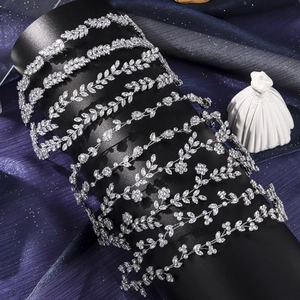 Detailed view of elegant silver bridal headbands with shimmering marquise zircon crystals