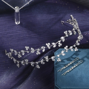 Elegant silver bridal leaf headband set with zircon stones on premium purple fabric