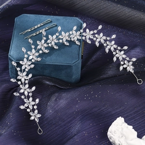 Silver floral bridal headband with cubic zirconia stones on luxury velvet background