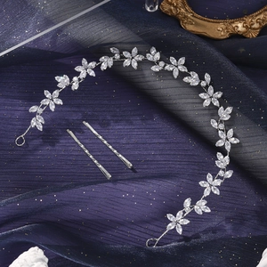 Elegant silver bridal headband set with marquise zircon flowers on blue satin